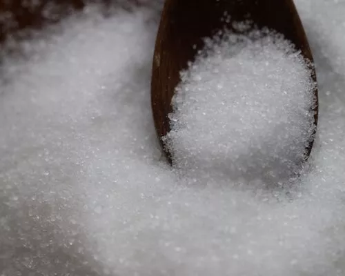 Granulated Sugar on a Spoon